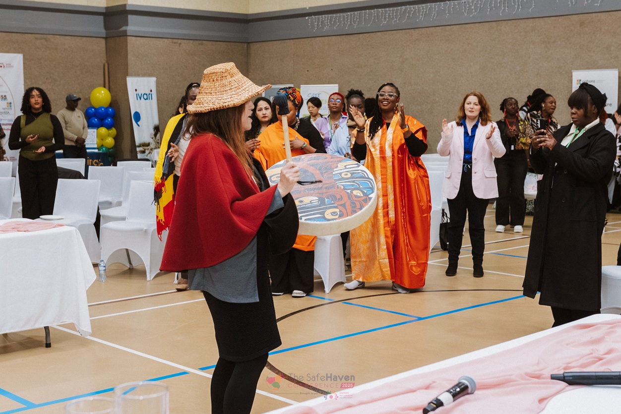 Guests mingling and welcoming each other at a previous Safe Haven Conference